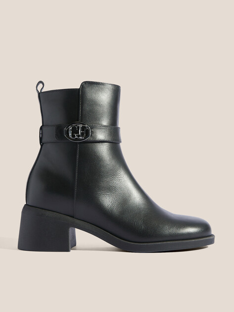 На фото: ботильоны GIOVANNI FABIANI с устойчивым каблуком, артикул 4546280 (магазин Rendez-Vous)